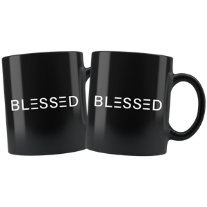 Two Black 11 ounce coffee mugs with signature Blessed text 