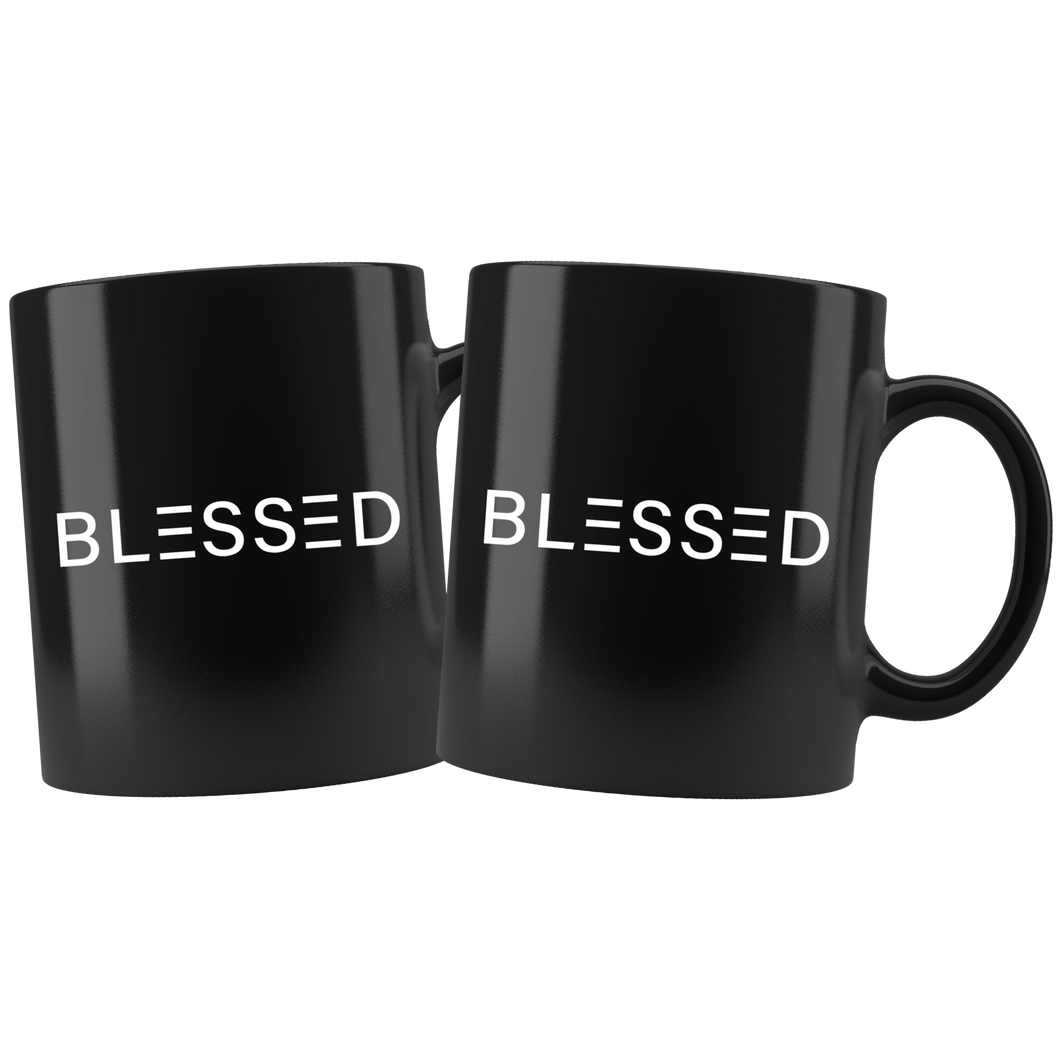 Two Black 11 ounce coffee mugs with signature Blessed text 